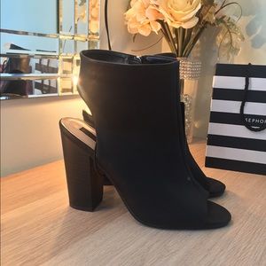 Size 8 faux leather booties.