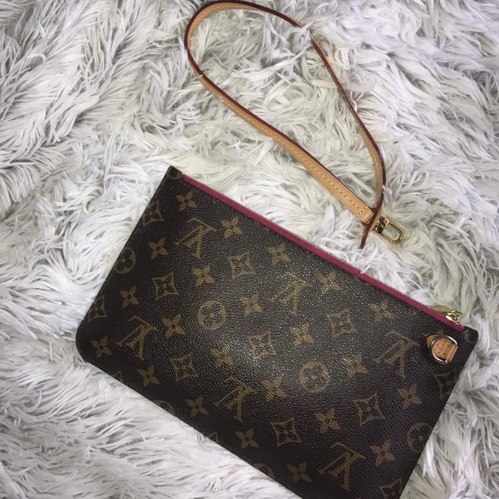 Louis Vuitton clutch with strap