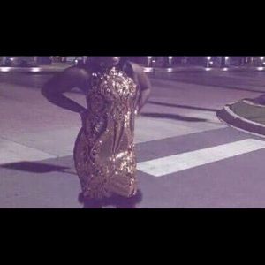 Sequence black and gold dress