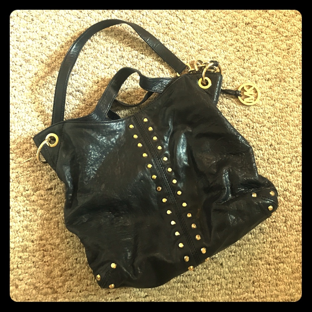Michael Kors black and gold studded hobo bag