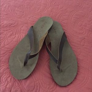 Brown flip flops