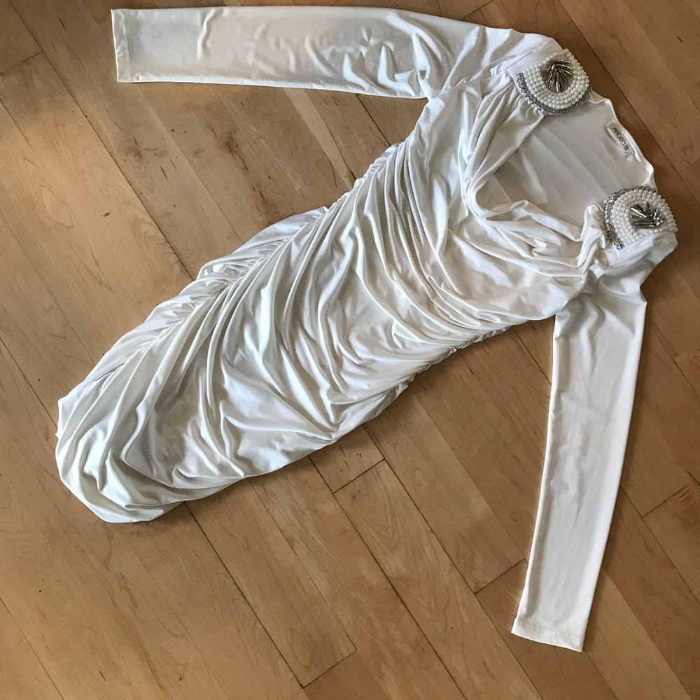 Sexy cowl neck fitted over knee dress .