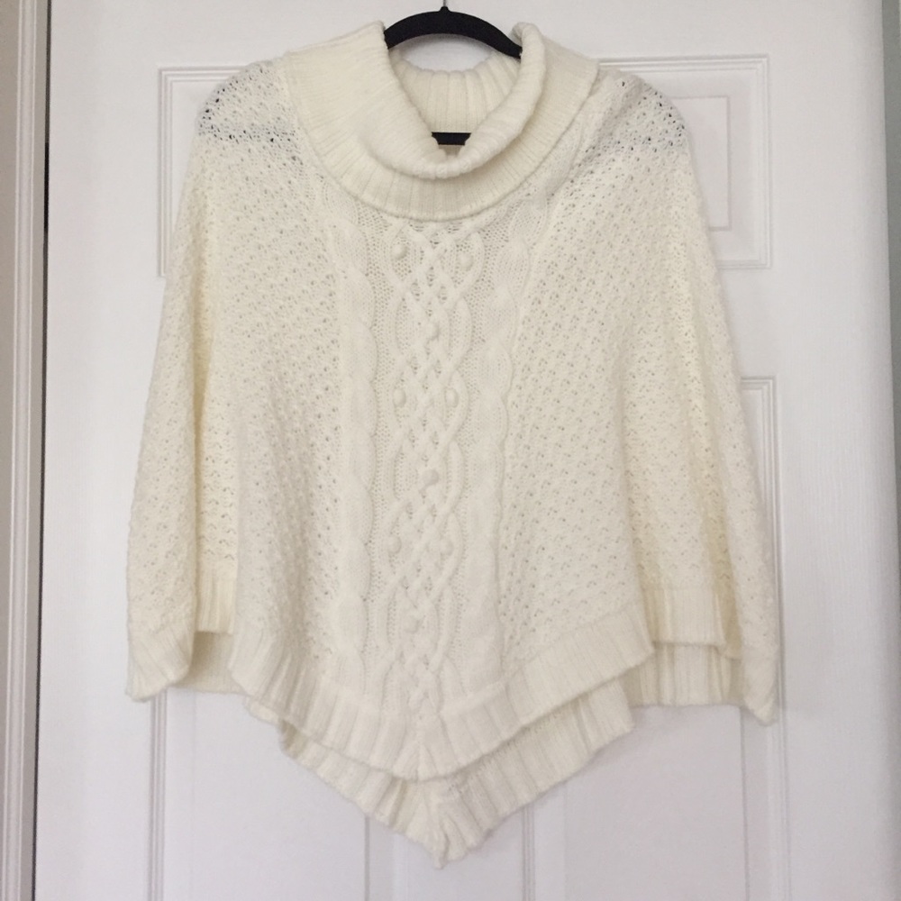 Super cute creamy color poncho/cape.