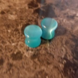 Aqua cats eye plugs