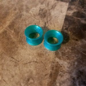 Teal ear skin tunnel