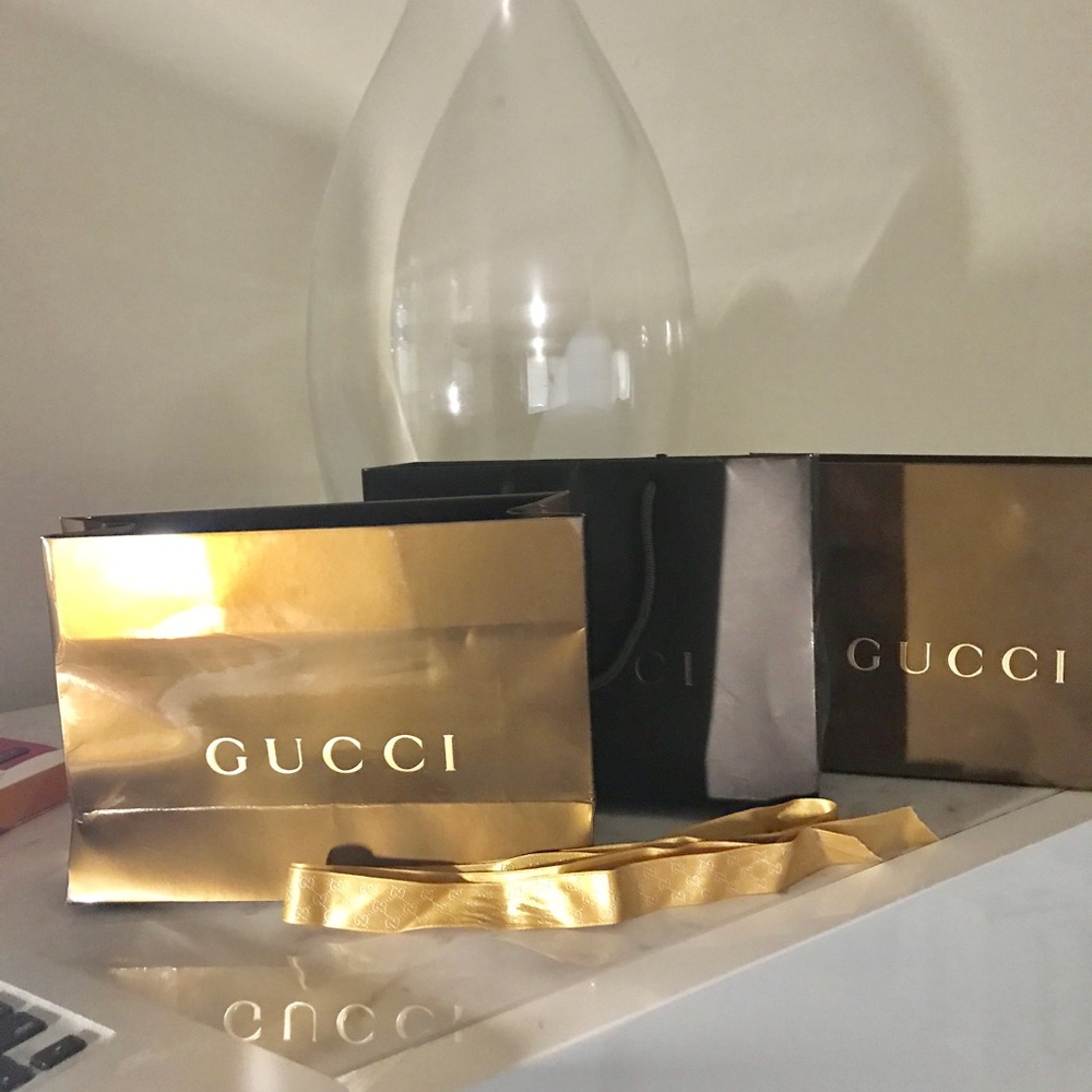 3 Gucci shopping bags with 1 ribbon