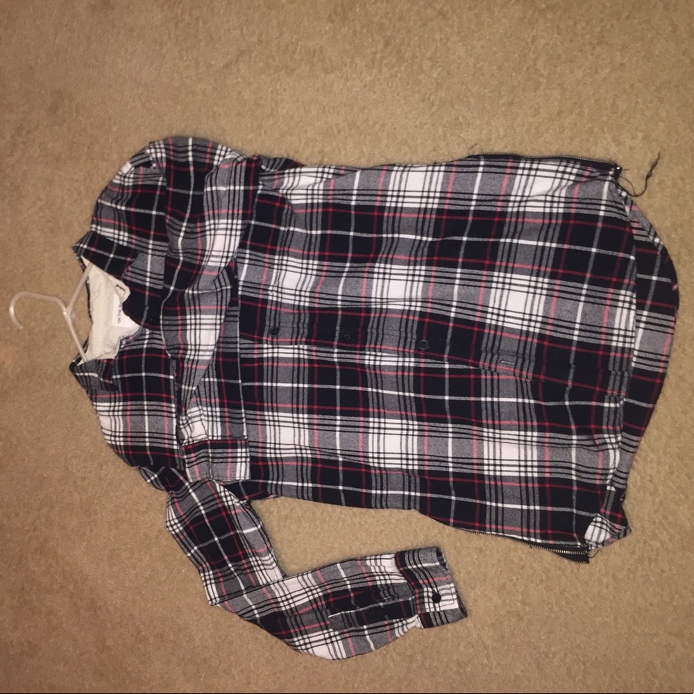 On The Byas "Longer Length" side zip flannel.