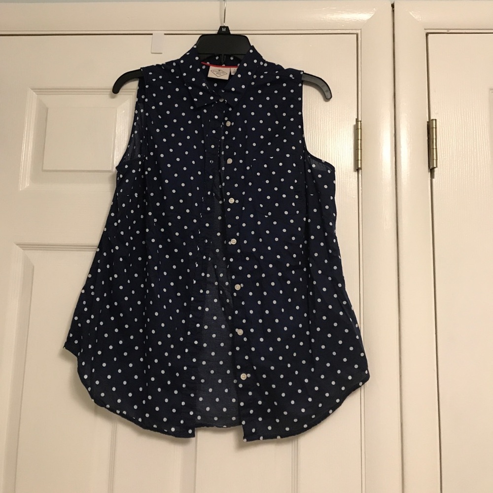 Navy blue and polka dot sleeveless blouse