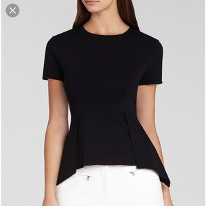 Black peplum top with back zipper