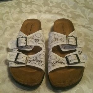 ivory colored crocheted slides by American Eagle