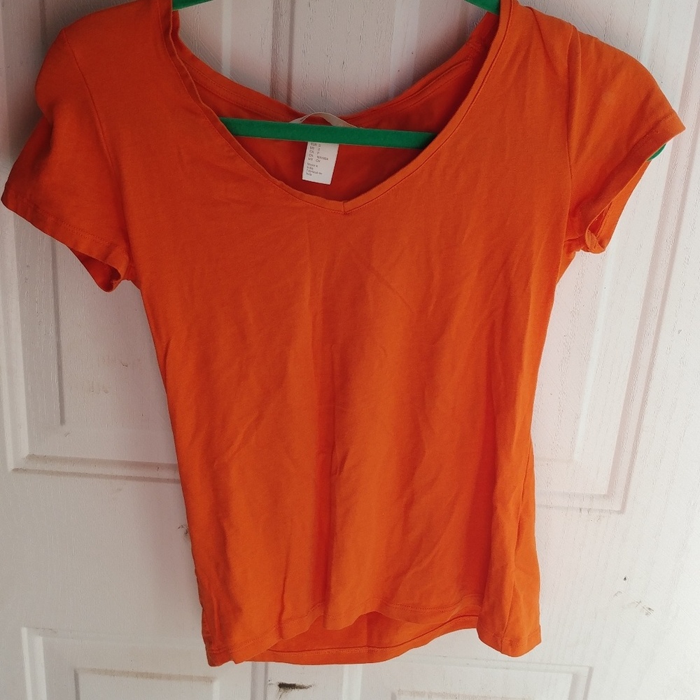2 H&M shirts. 1sm 1med but fit the same