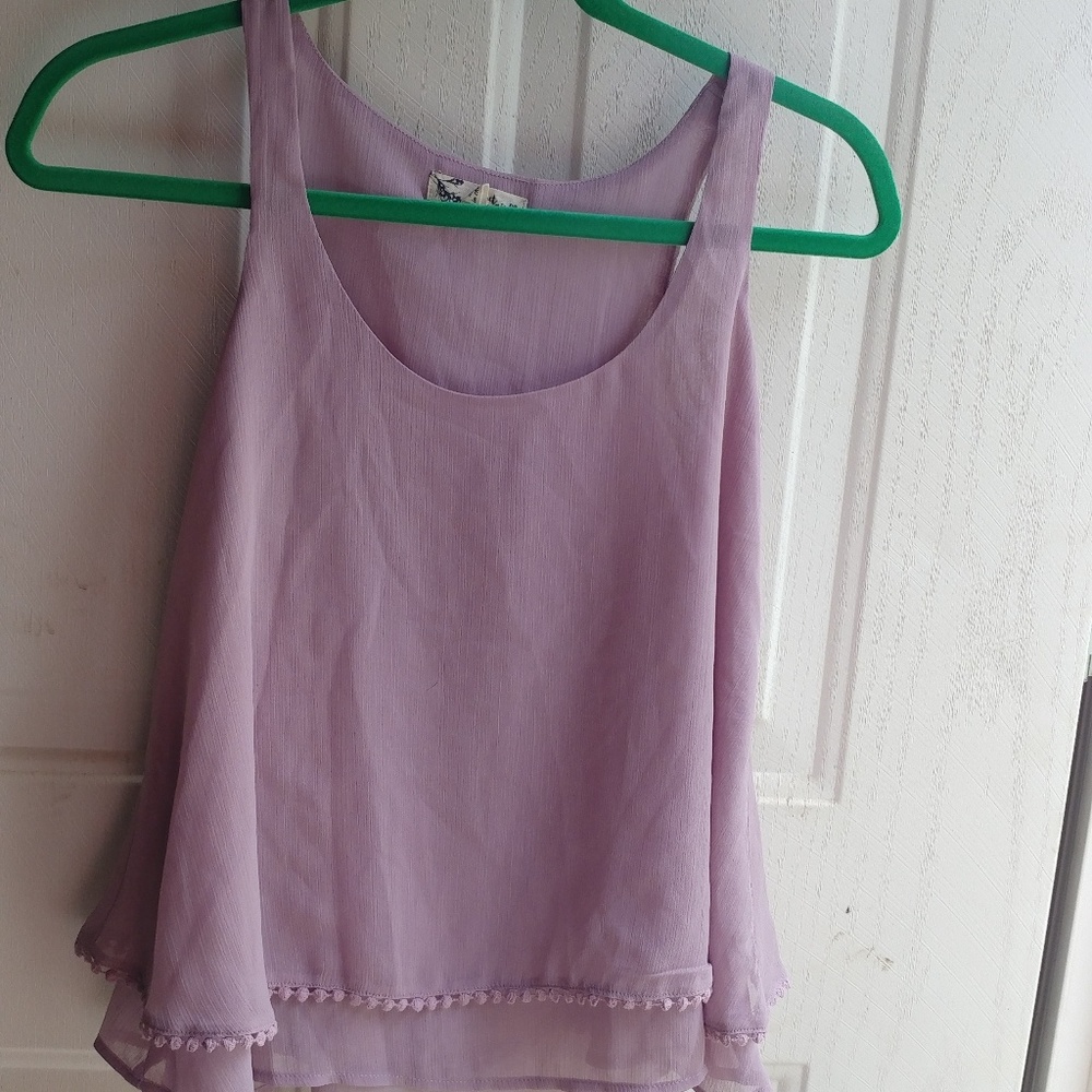 About a girl xs tank. Fits like a sm