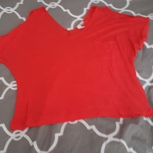 Flowy orange cold shoulder top