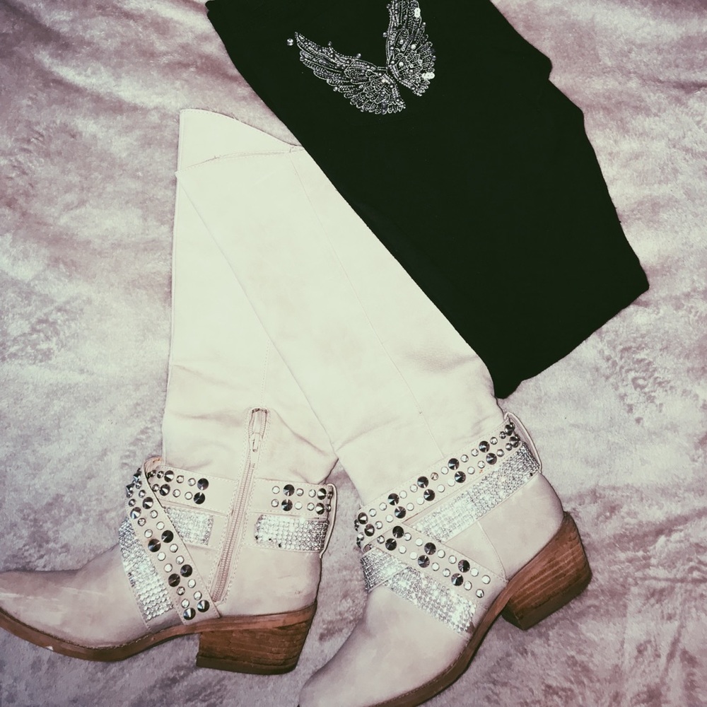 Cream colored boots with jewel details