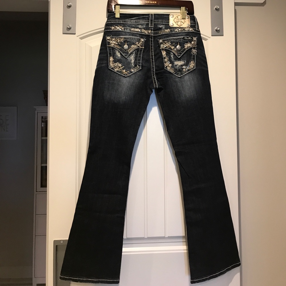 Size 28R. Miss Me mid rise bootcut jeans.