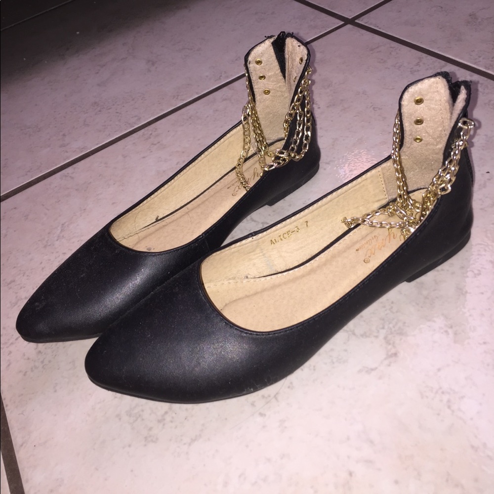 Black flats with gold chains