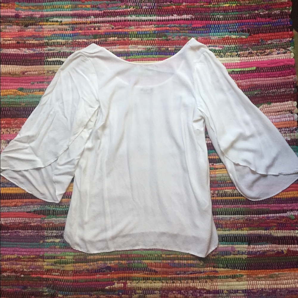 Modern meets bohemian white top with split sleeves