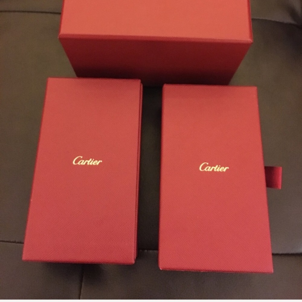 Two Cartier boxes