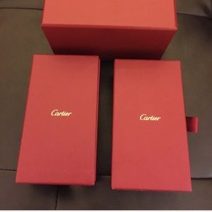 Two Cartier boxes