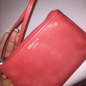 orange coach wristlet