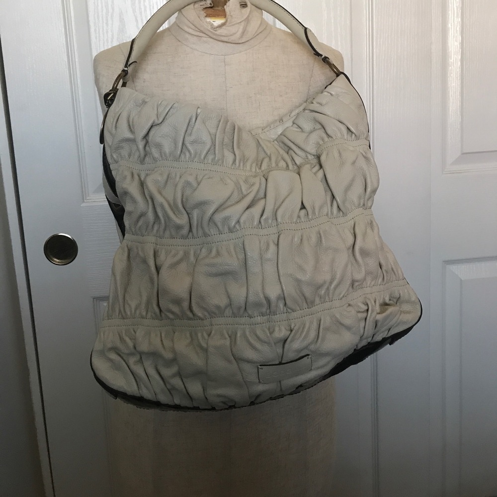 BCBGirls cream and blue patent leather handbag