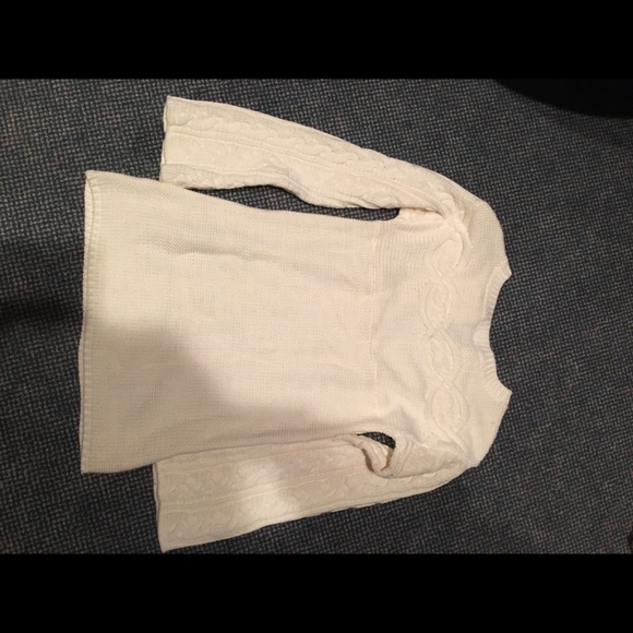 Small cableknit sweater with tie strings at neck. - Picture 3 of 3