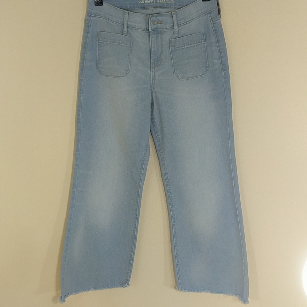 Cropped Flared Asymmetric Hem Jeans