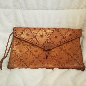 Leather stamped clutch