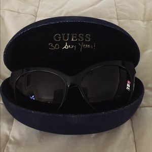 GUESS black, cat eye sunglasses.  Never used.