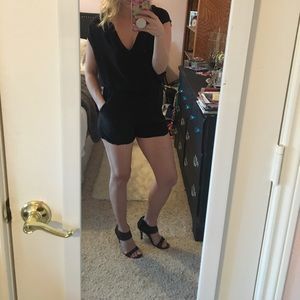 Black romper with open slit back