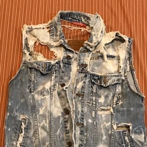 Distressed cut out jean jacket