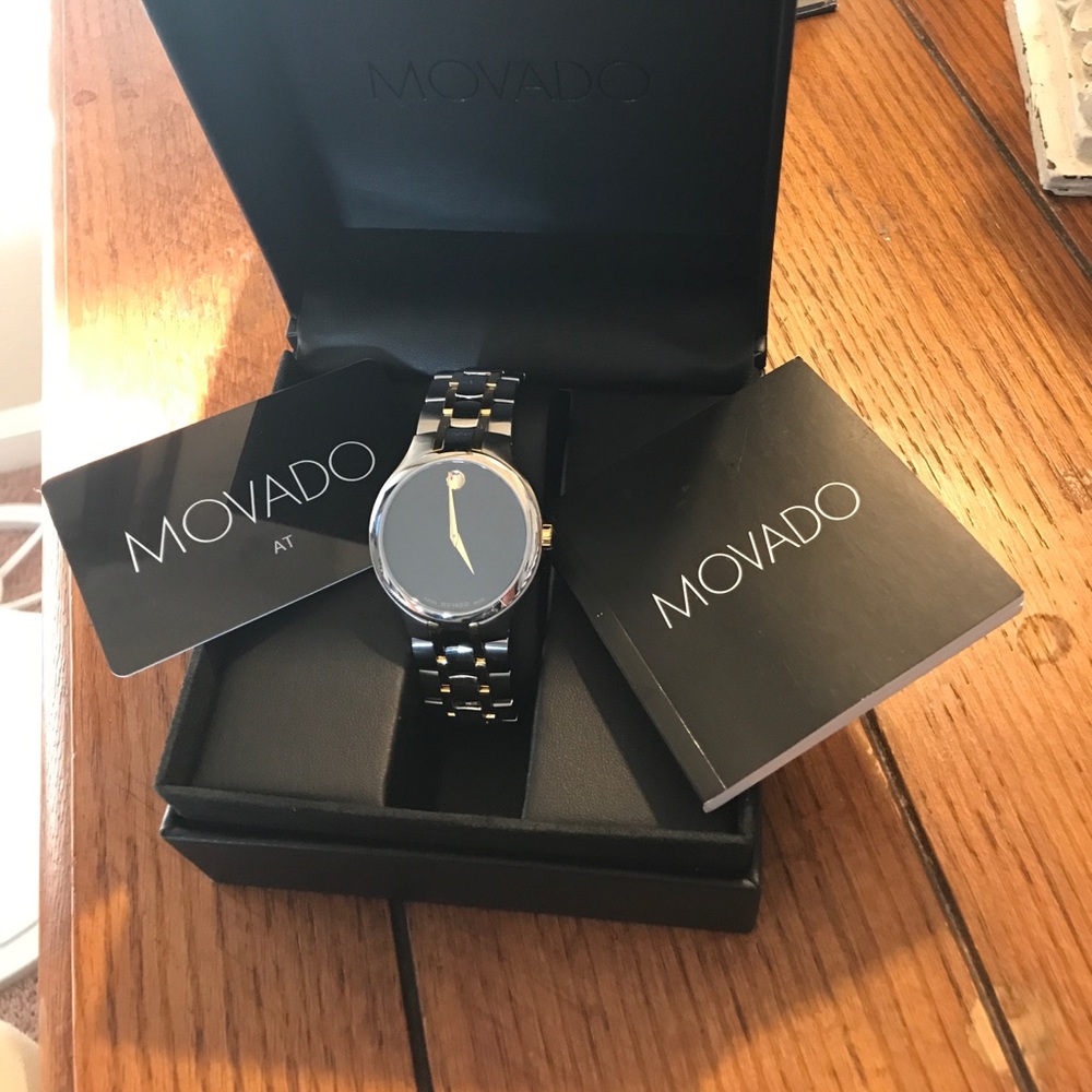 New, never worn men's Movado watch.