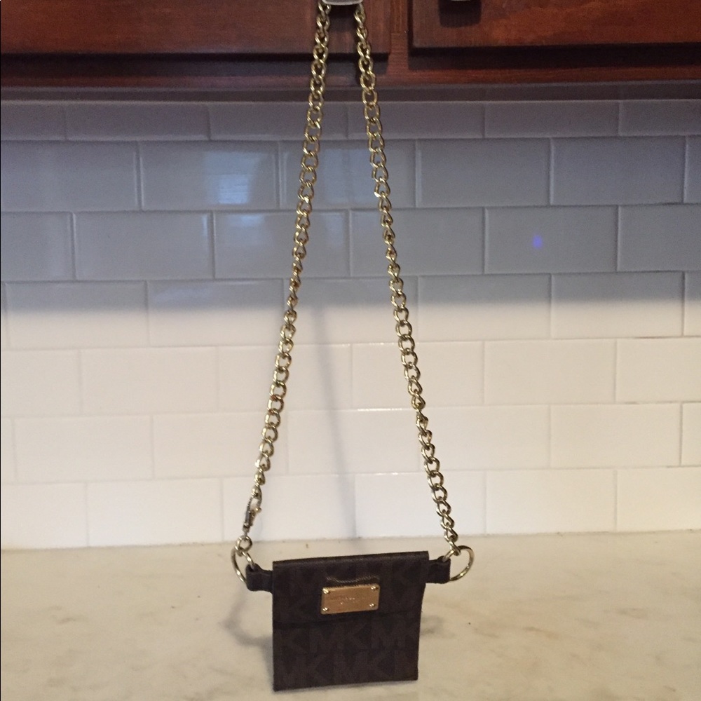 Cute and fun MK gold chain link belt and pocket.