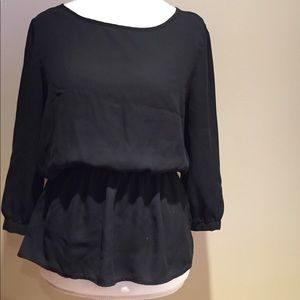 Black, fitted waste blouse