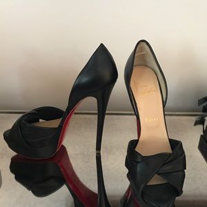 Authentic Christian Louboutin pumps, black.