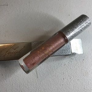 Never worn MAC LE Lipglass in Dreamlover