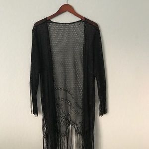 Loose knit, fringe kimono top