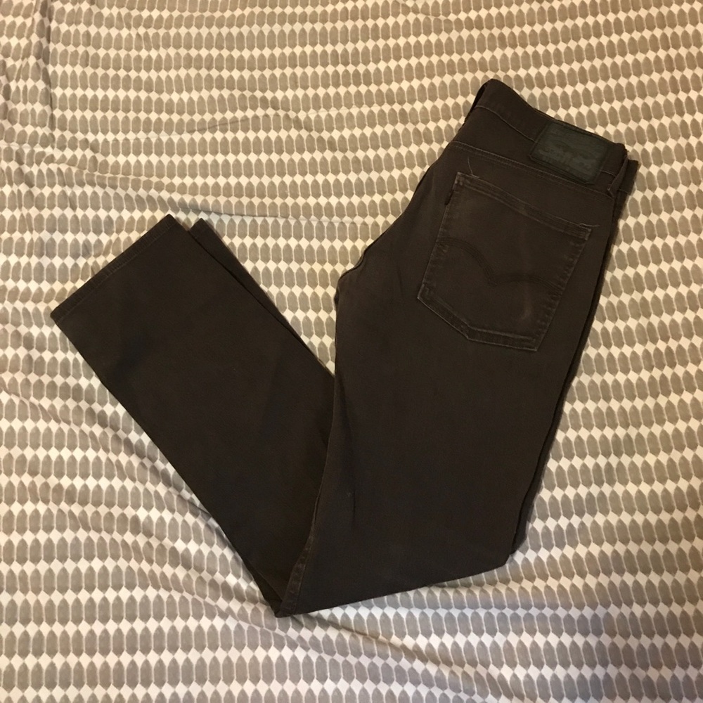Gray Levi’s 511 jeans.