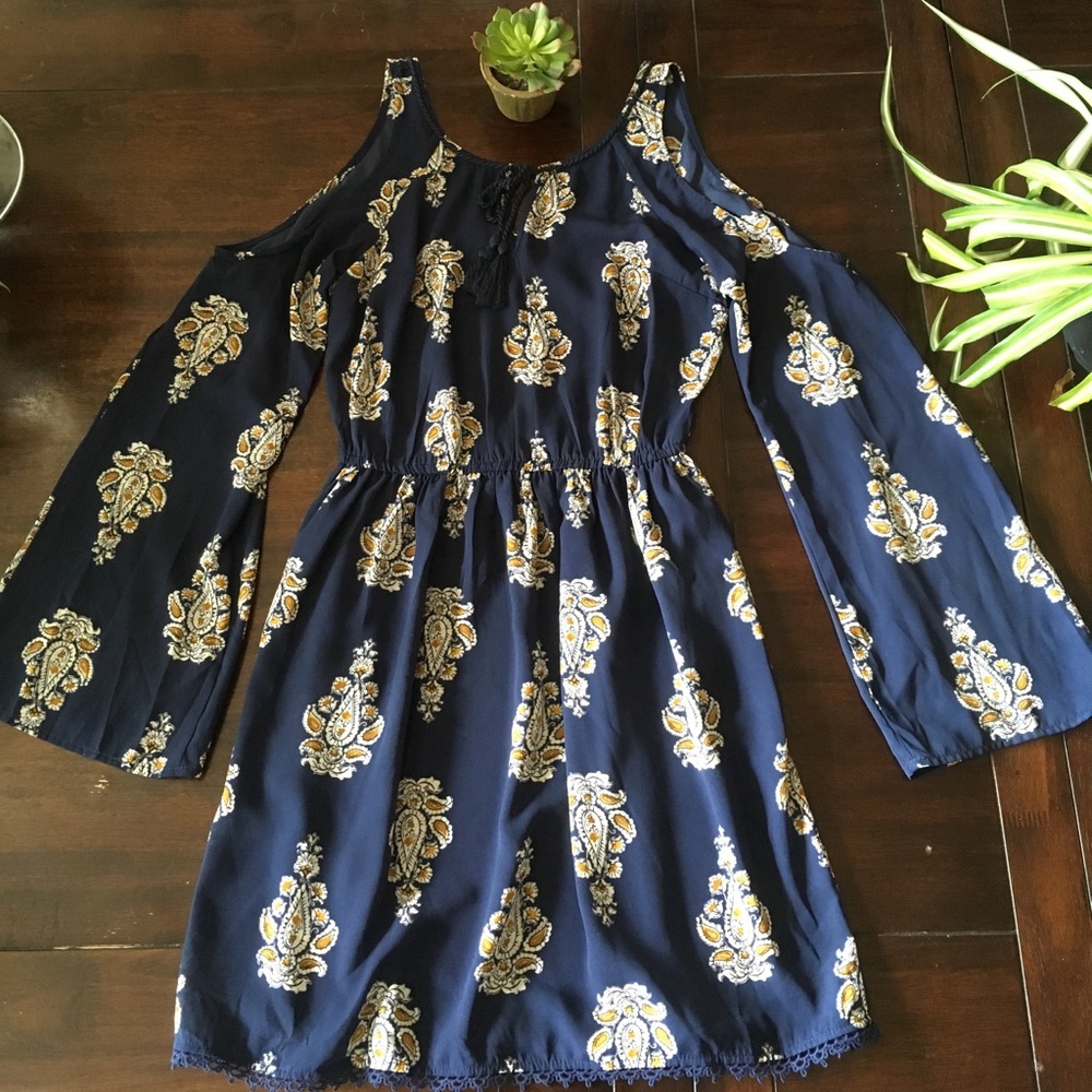 Fun and flirty cold shoulder dress