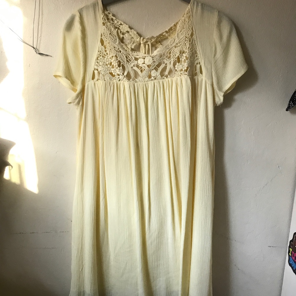 Beautiful yellow flowy dress.