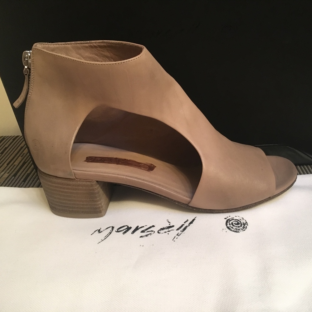 Tan bootie with peek-a-boo toe and cut-out.