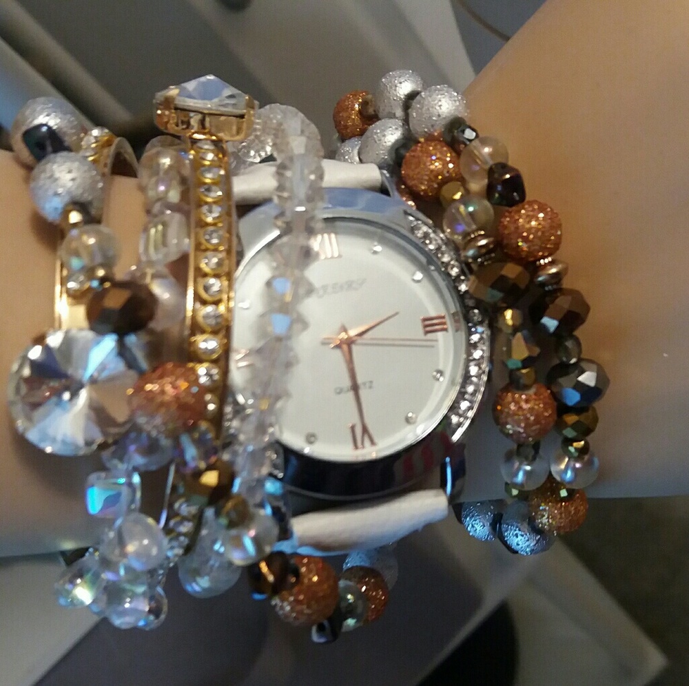 20% off 3+ items; White faux leather fashion watch