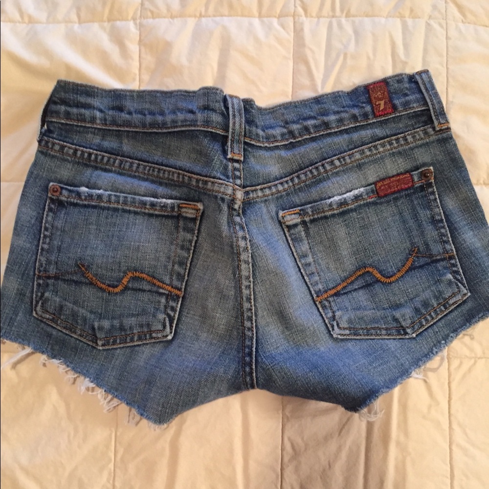 Great wi/ a bikini!  7FAM cut off denim shorts.