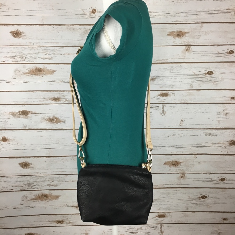 Charming Charlie black and tan crossbody purse