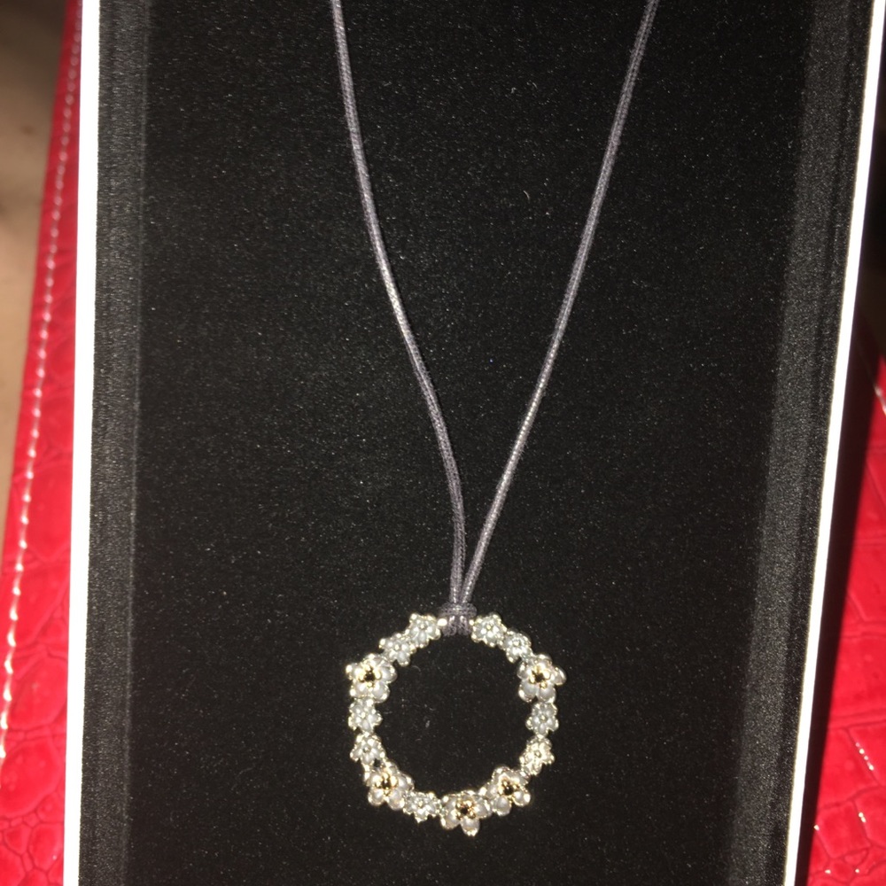 Authentic Pandora retired 2 tone round pend