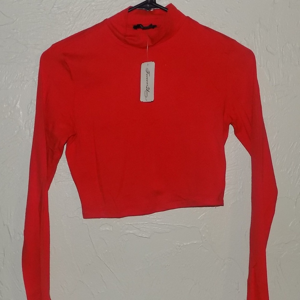 Long sleeved red-orange crop top