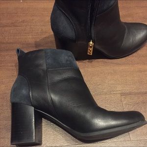 Black leather and suave Cole Haan Booties