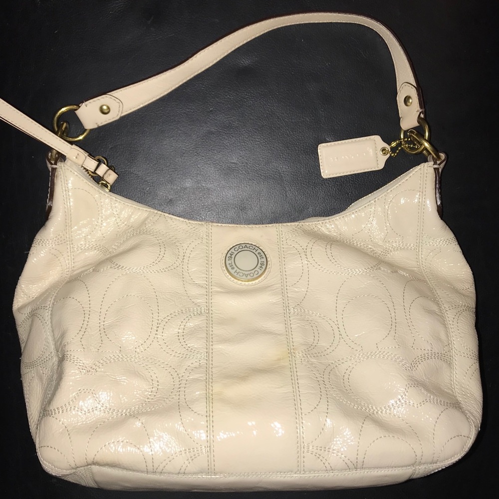 Cream coach tote handbag doubles as crossbody
