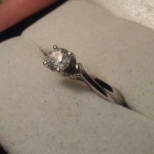 1/4  carat 14 kt white gold solitary diamond ring