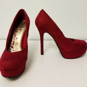 TRASH red high heel shoes